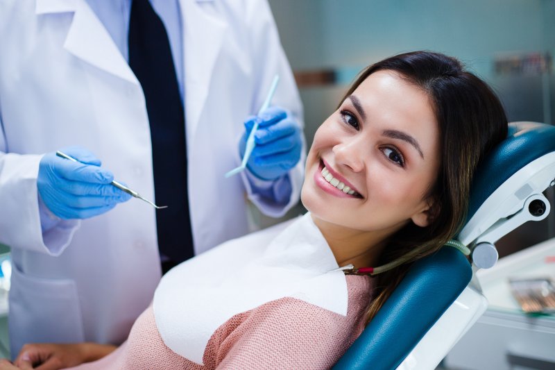 young woman receiving a dental checkup